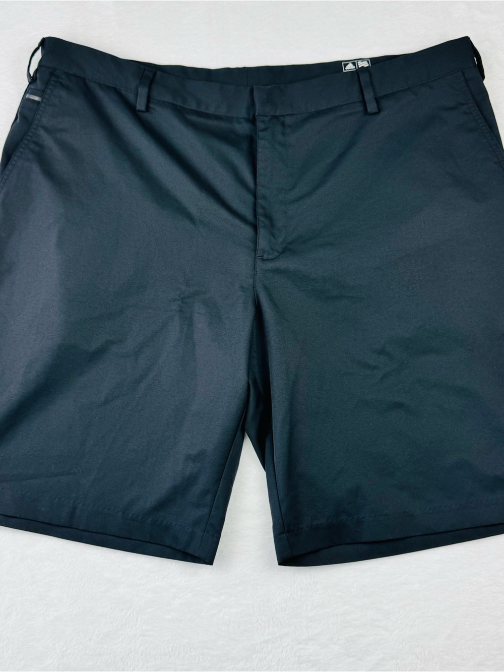 Adidas Men's Golf Shorts. Flat-front design and rear pockets. Men’s size 40